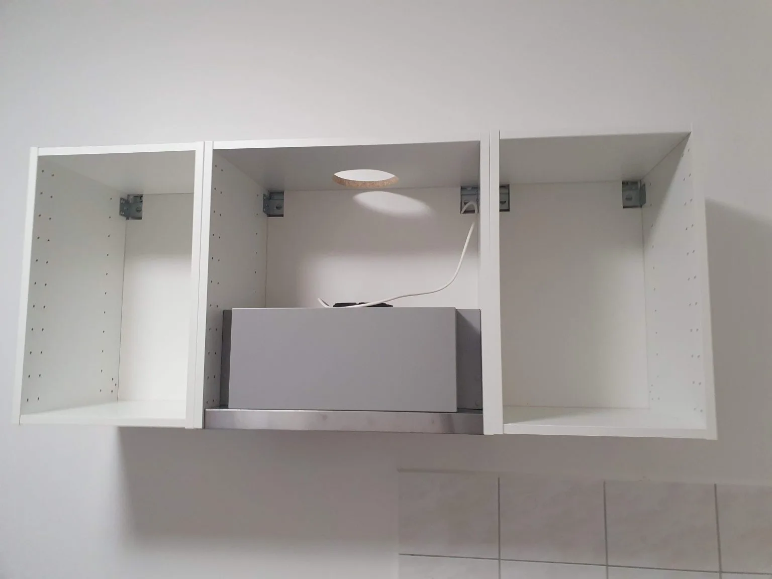 Usadili jsme digestoř